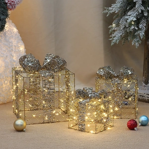 Three-piece set of glowing Christmas gift box decorations with warm LED lights and sequins