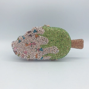 Exquisite fish-shaped evening clutch bag with emerald and champagne crystals
