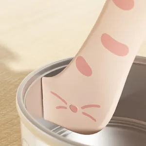 Pink silicone cat paw shaped spoon for efficiently scraping pet food from can corners
