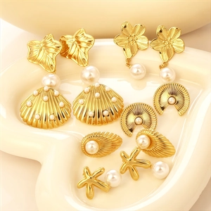 Golden titanium steel earrings collection with pearls featuring starfish and leaf designs