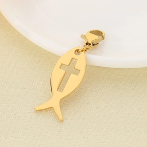 Close-up of golden hollow fish-shaped cross pendant with lobster clasp for DIY accessories