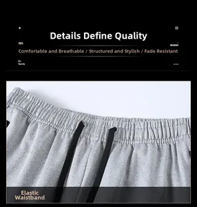 Detalle de pantalones grises con cintura elástica y cordones ajustables negros