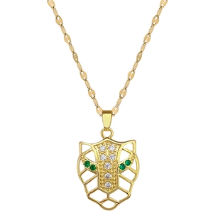 Luxurious gold titanium steel leopard necklace with sparkling crystals and green gem eyes