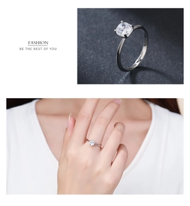 Detail of s925 silver ring featuring a square cut solitaire diamond and model showcase