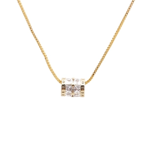 Detail view of gold lucky eye necklace with crystal stones and VELOV engraving