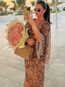 Summer leopard print long sleeve dress with deep V-neck and stylish flared sleeves