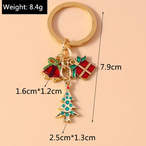 Detailed specs of Christmas keychain with bell and tree charms showing 8.4g weight