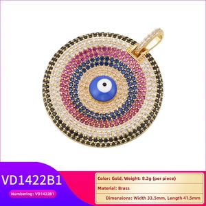 Detailed size view of a 33.5mm by 41.5mm brass evil eye pendant with colorful zircons