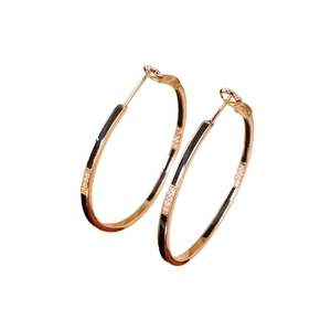 14k gold plated round hoop earrings with black enamel and sparkling crystal inlay