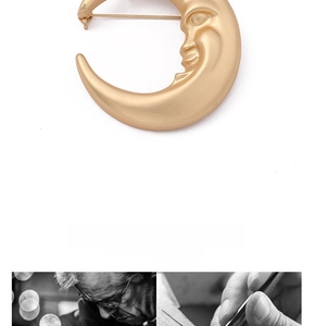Macro detail of vintage gold crescent moon brooch with brushed metal texture and profile face