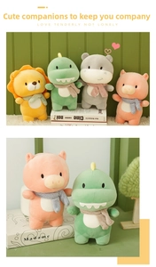 Detail of plush animal toys featuring lion and dinosaur with colorful knitted scarves
