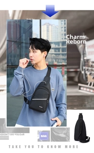 Men's black crossbody chest bag detail with waterproof fabric and earphone port