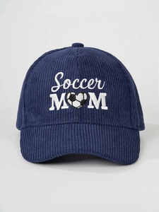 Detail of Soccer MOM heart embroidery on navy blue corduroy baseball cap texture