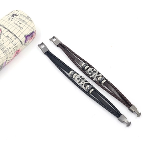 Punk skull beaded leather bracelet in black and dark brown with metal clasp