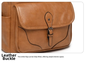 Detail of caramel brown leather buckle and vintage texture on women's backpack