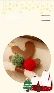 Close-up of Christmas reindeer antlers headband with red and green fluffy pom-poms