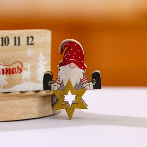 Wooden Christmas gnome countdown calendar ornament with a red hat and golden star