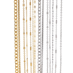 Various vacuum gold plated stainless steel chains in mixed designs on white background
