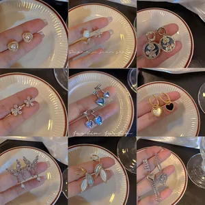 Detailed collection of s925 silver needle stud earrings featuring cubic zirconia and pearls