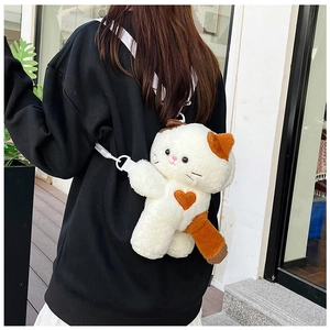 Detailed back view of a plush calico cat backpack with adjustable white shoulder straps