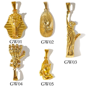 Golden stainless steel Egyptian pharaoh and skull hand pendants set on white backdrop