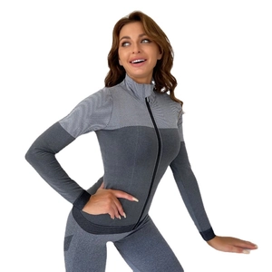 Women's dark grey zipper yoga jacket and leggings set with geometric knit pattern