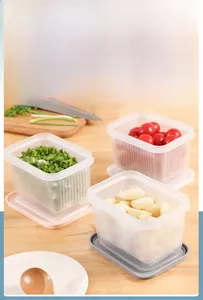 Detailed view of 3-piece double-layer food storage boxes with pink, white and grey lids