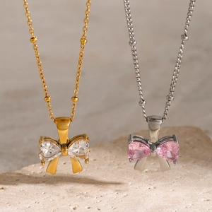 Elegant 18k gold stainless steel bow necklace with sparkling zircon heart pendant