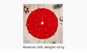 Détail de la jupe de sapin de Noël rouge en tissu non tissé avec broderies et pompons