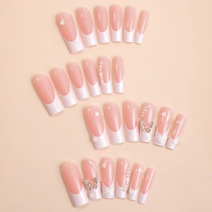 Long coffin fake nails with 3D butterfly, pearls, and classic pink white french tip