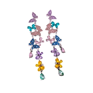 Elegant butterfly tassel earrings with colorful crystals and floral accents on white background