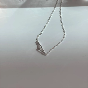 Macro view of minimalist 925 sterling silver chain necklace with secure hook clasp