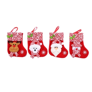 Set of 4 red felt Christmas stockings with reindeer polar bear santa and snowman