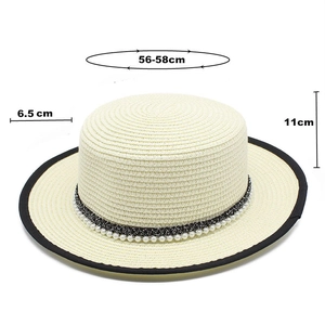 Detail showing the flat top straw hat with dimensions 56-58cm brim 6.5cm and height 11cm