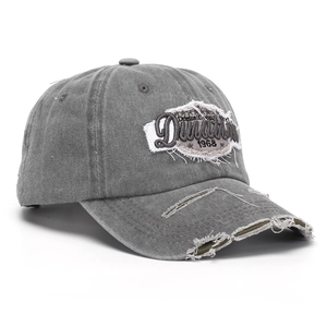 Close-up of distressed cotton baseball cap with vintage 1968 embroidery details