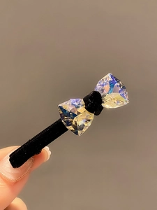Elegant black velvet bow hair clips with shimmering crystal rhinestones for women