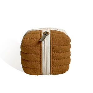 Quilted fabric cube cable storage bag for earphones with white zipper in brown color