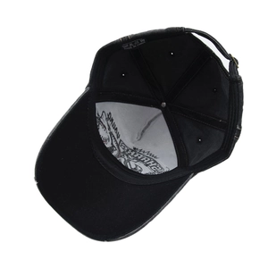 Inside view of black vintage baseball cap showing shark embroidery and adjustable strap
