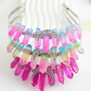 Detailed view of bohemian crystal crown headbands with purple gradient and silver moon accent