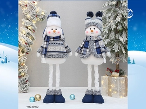 Close-up of blue fabric telescopic Christmas snowman plush dolls with knitted hats