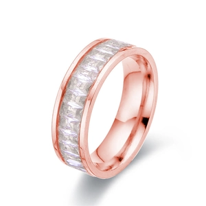 Rose gold titanium ring with full circle of rectangular clear zircons on white background