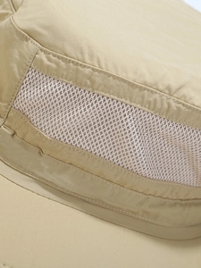 Detail view of khaki sun hat featuring breathable mesh panels and precision stitching