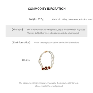 Detail view of double-layer pearl necklace with red crystal accents and sizing specs