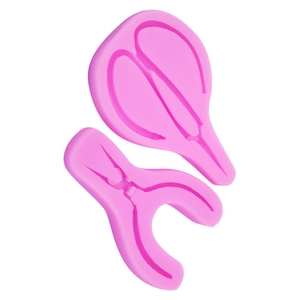 Stampo in silicone rosa con forme di forbici e pinze per decorazioni fai-da-te di dolci