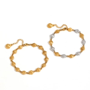 Marine style stainless steel shell bracelets in gold and bicolor finishes with adjusters