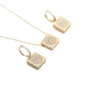 Golden lion head jewelry set featuring a zircon necklace and matching earrings