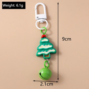 Christmas tree keychain with white snow detail, green bell, and size measurements