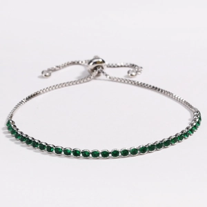 Adjustable silver chain bracelet with round green zircon stones and drawstring slider