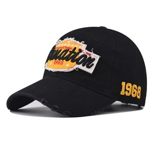 Black cotton baseball cap with vintage nation 1968 embroidery and distressed brim edge