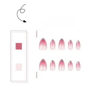 Détail de faux ongles dégradés roses avec paillettes et forme ovale élégante